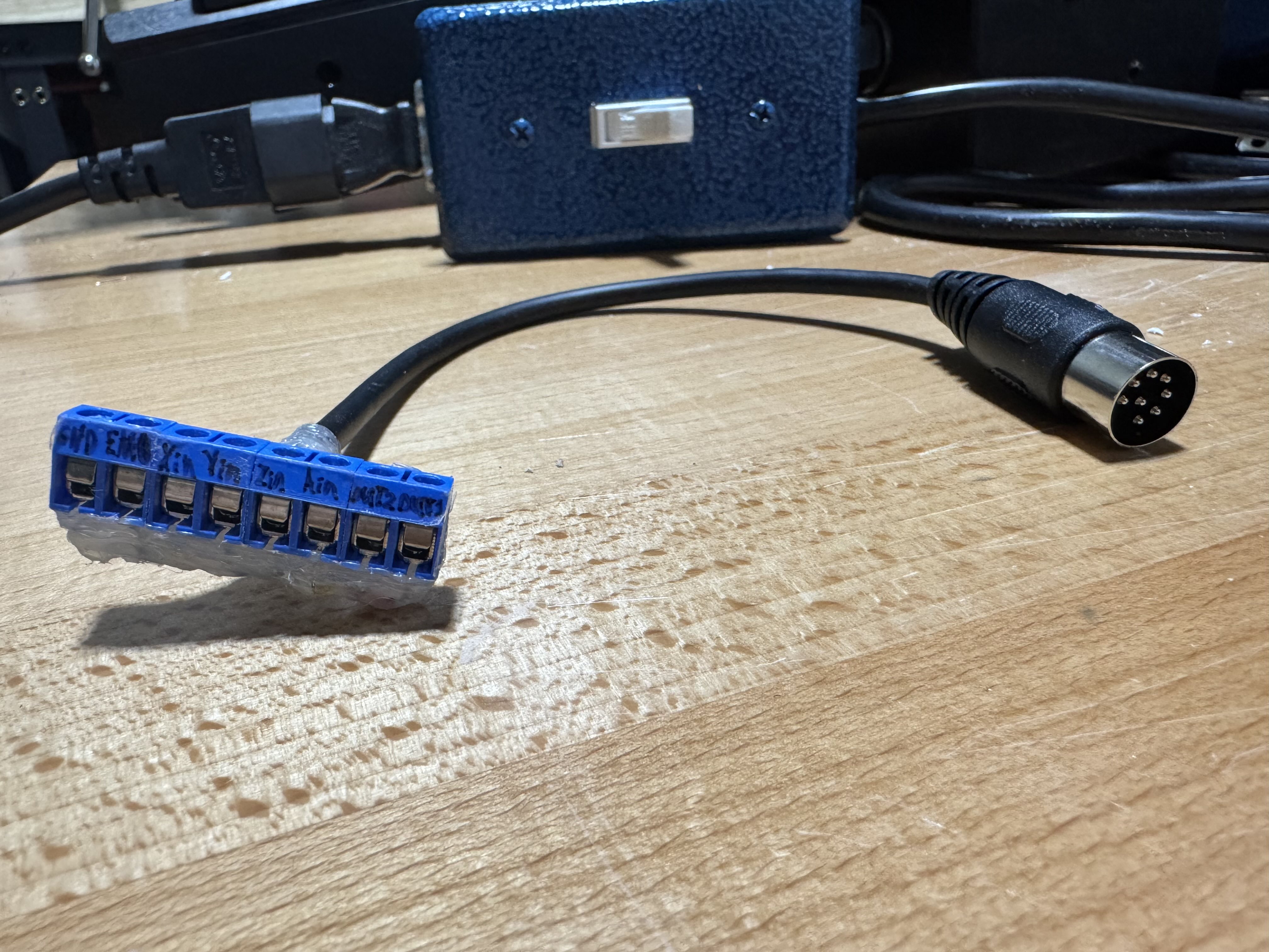 Cable with DIN-45326 (type 8A) connector on one end and an 8-pin screw terminal on the other