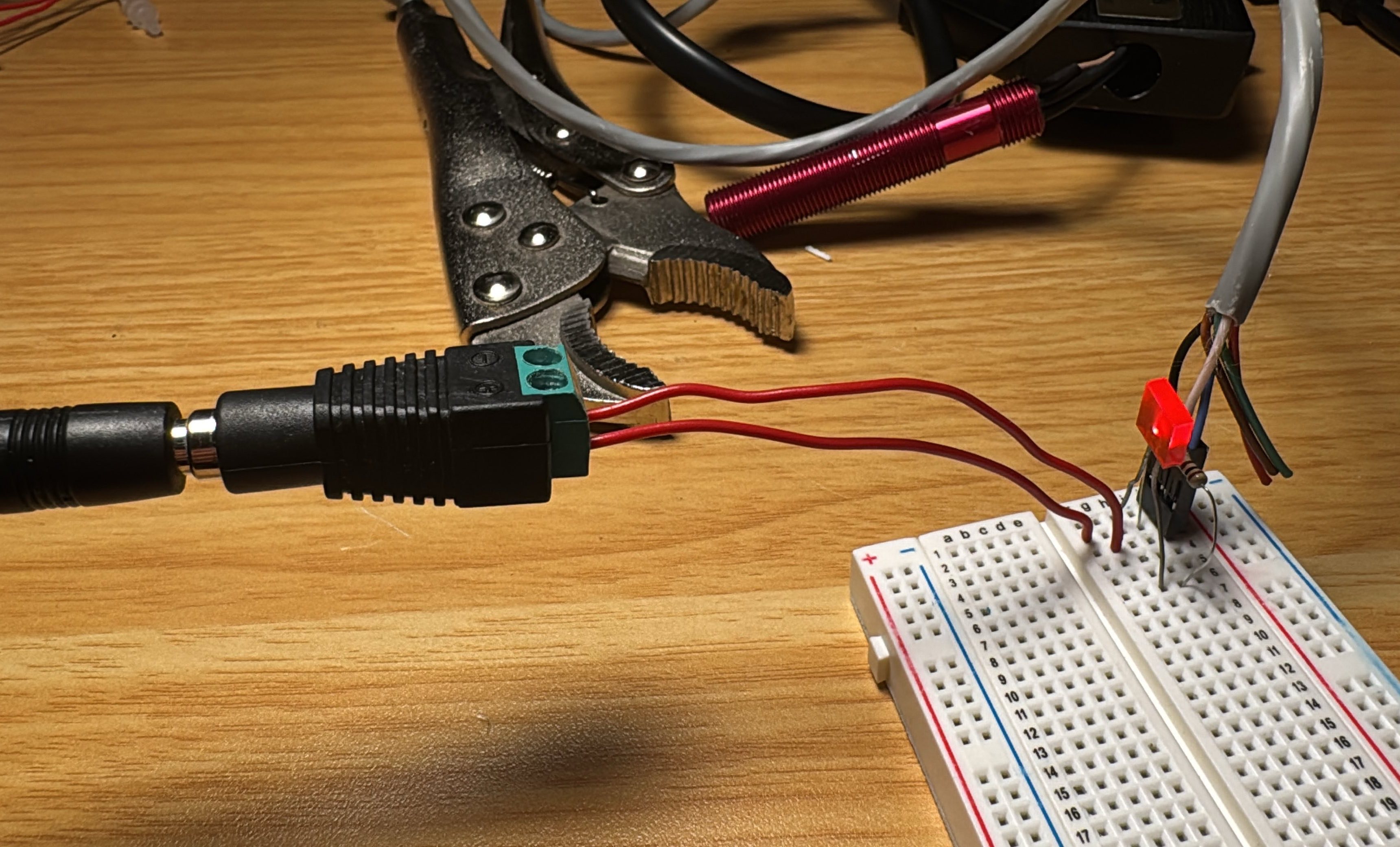 DISP detecting a metal object, which lights up an LED in the test circuit