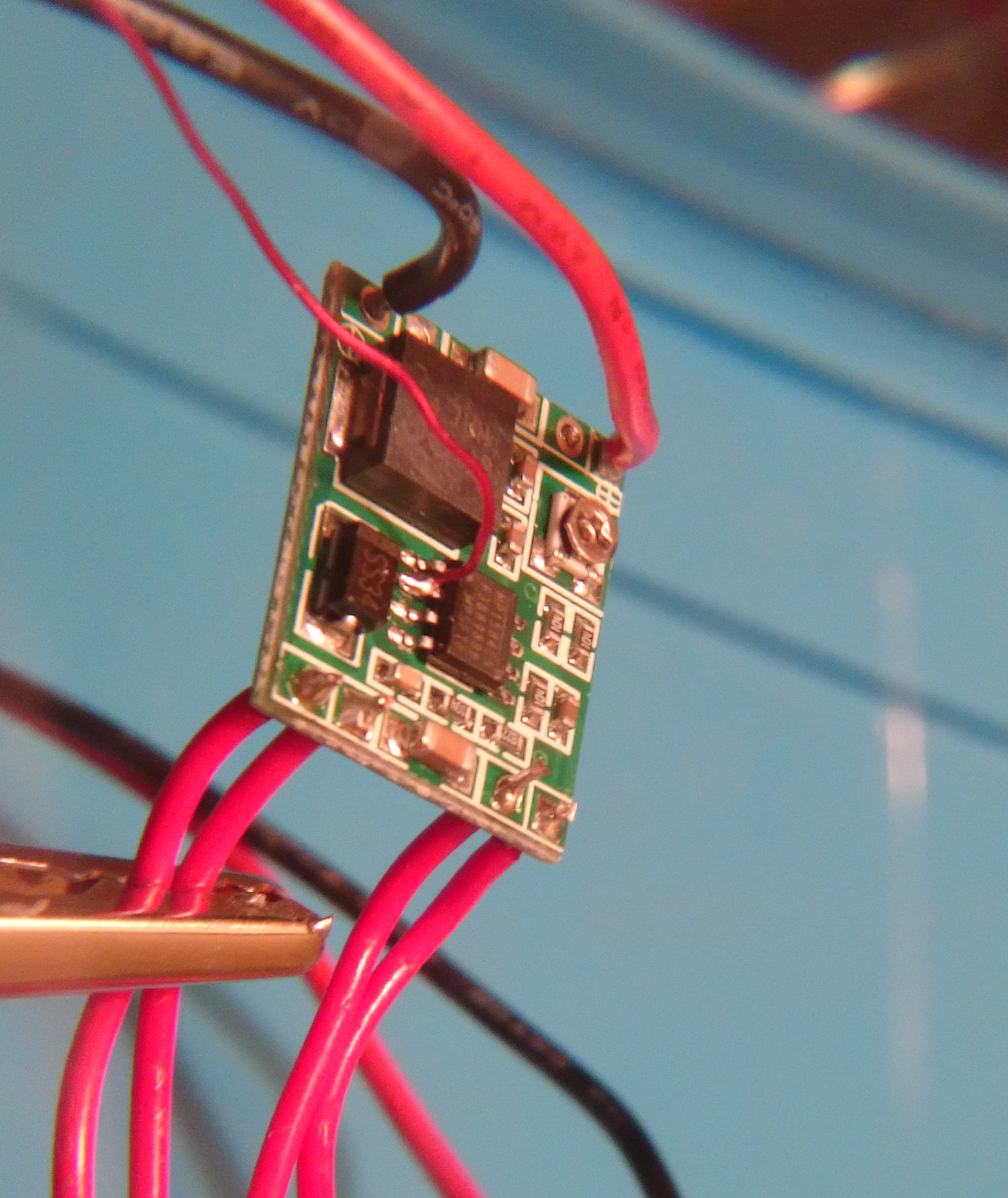 Enamel wire soldered to pin 2 of the MP1584 on the DC regulator board