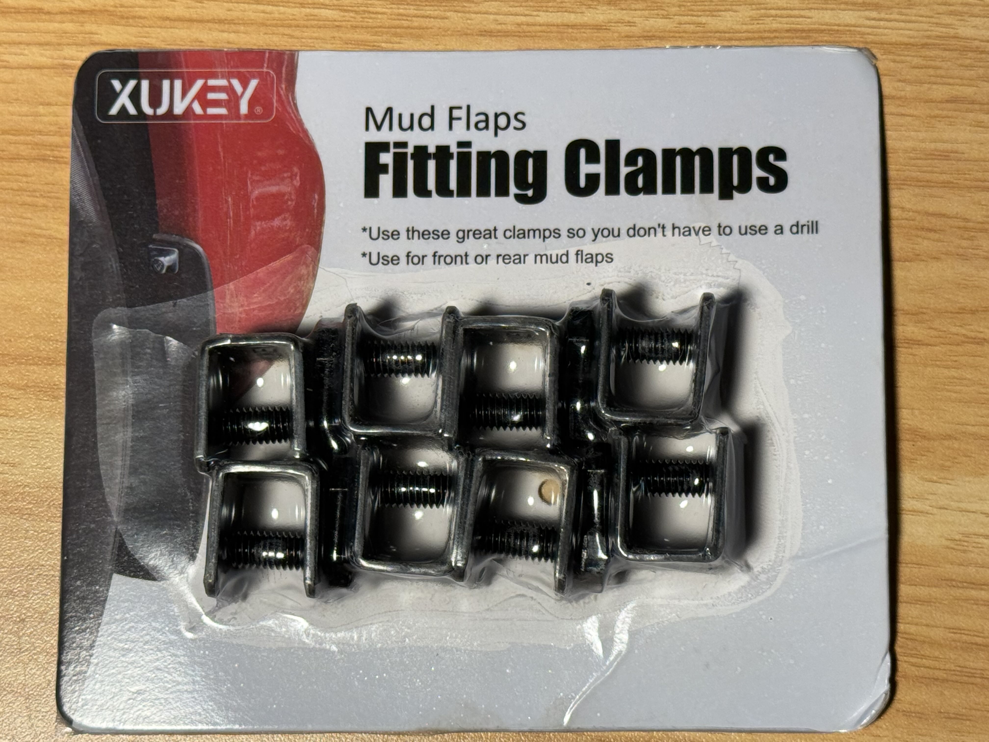 Small screw clamps, designed for securing mud flaps to a car